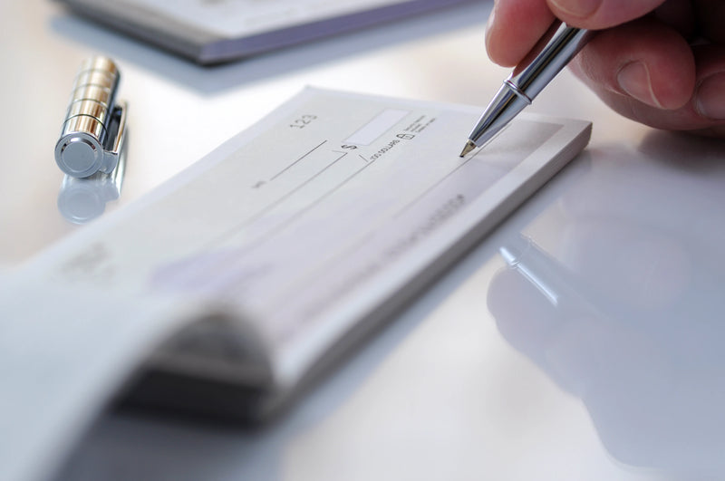 Writing a personal check closeup